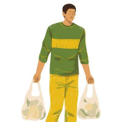 green shirt carrying groceries