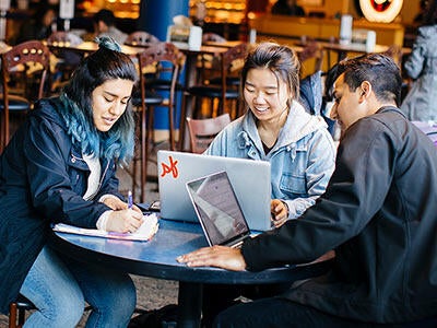 UCR students study during lunch at the HUB.