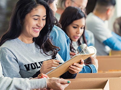 Students volunteer to organize food donations.